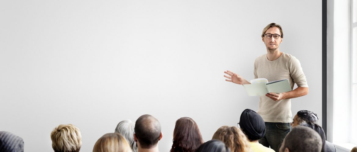 Guy giving a presentation to an audience